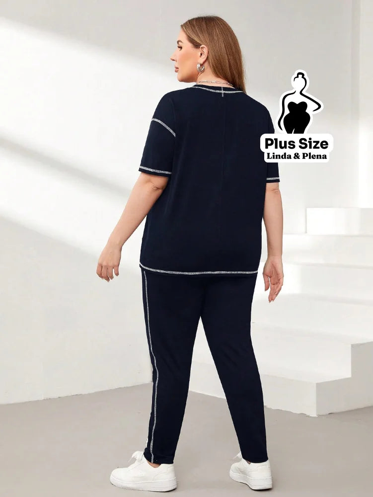 Conjunto Esportivo Com Blusa Solta E Calça Justa Plus Size Conjunto Esportivo Com Blusa Solta E Calça Justa Plus Size