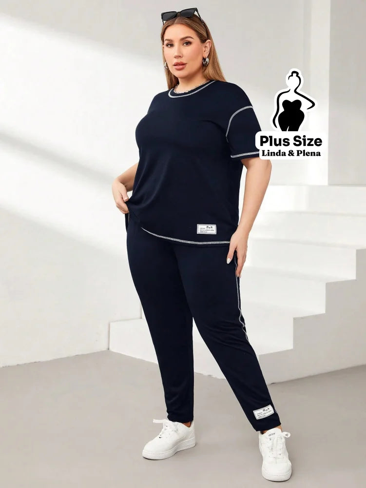 Conjunto Esportivo Com Blusa Solta E Calça Justa Plus Size Conjunto Esportivo Com Blusa Solta E Calça Justa Plus Size