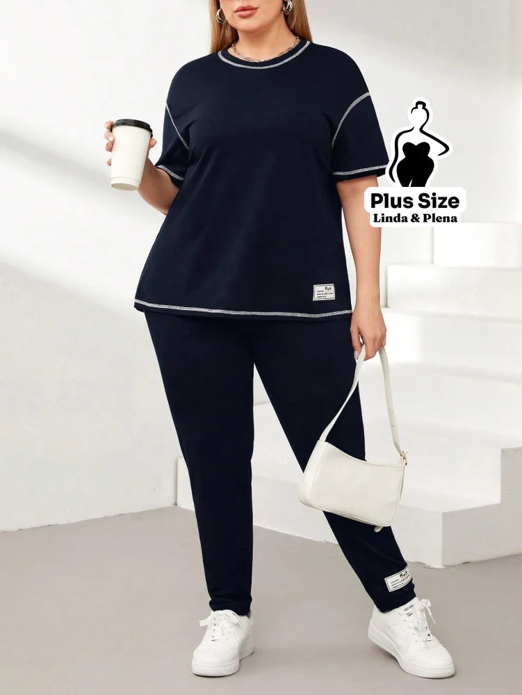 Conjunto Esportivo Com Blusa Solta E Calça Justa Plus Size Conjunto Esportivo Com Blusa Solta E Calça Justa Plus Size