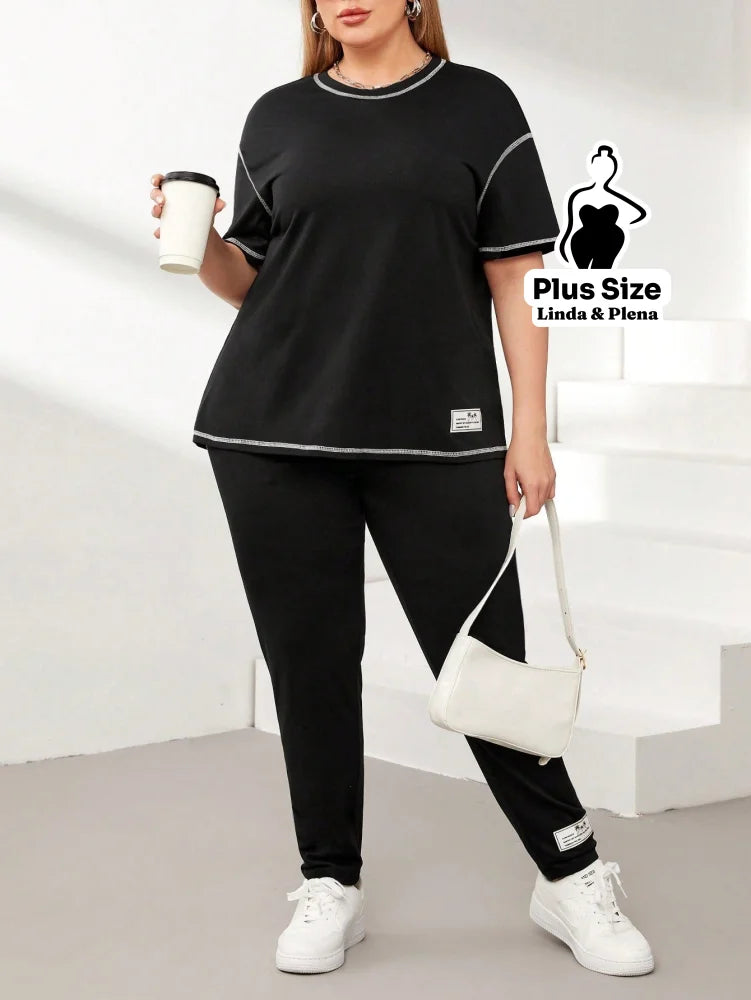 Conjunto Esportivo Com Blusa Solta E Calça Justa Plus Size Conjunto Esportivo Com Blusa Solta E Calça Justa Plus Size