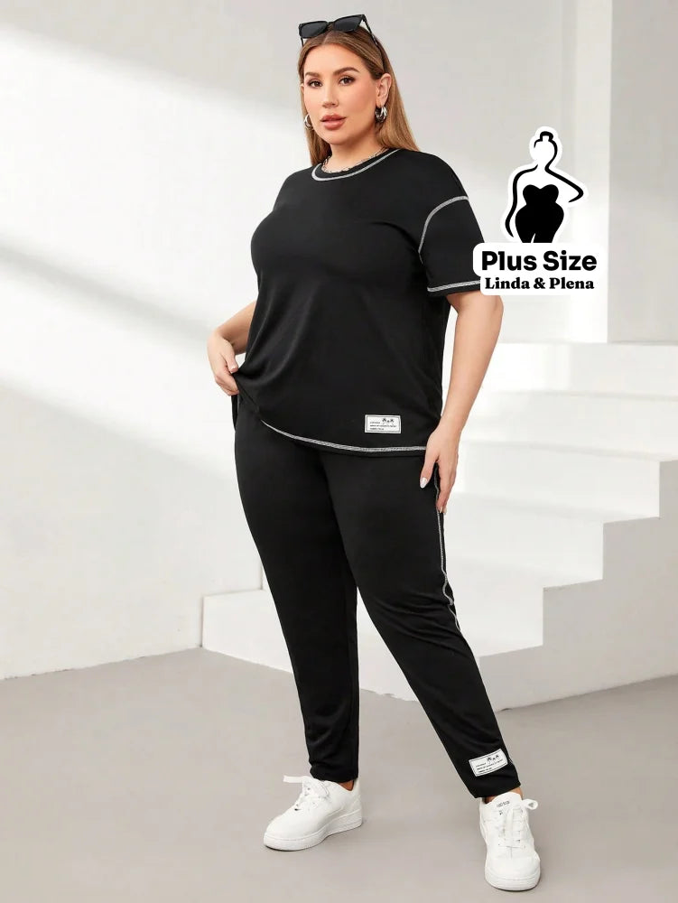 Conjunto Esportivo Com Blusa Solta E Calça Justa Plus Size Conjunto Esportivo Com Blusa Solta E Calça Justa Plus Size