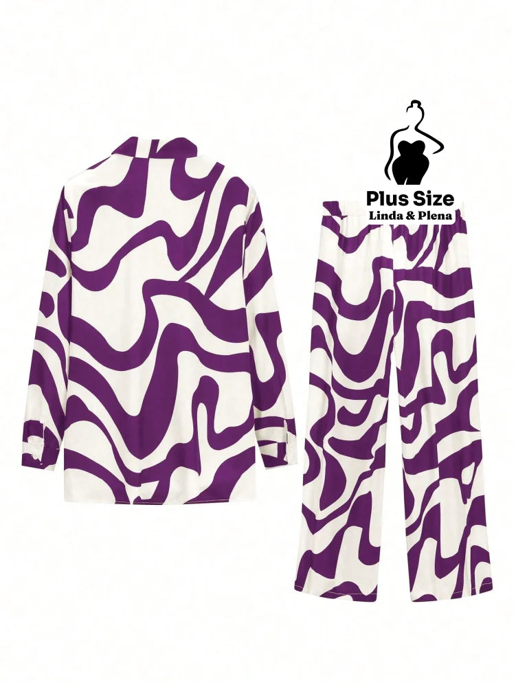 Conjunto Estampado com Camisa Aberta e Calça Solta Plus Size Conjunto Estampado com Camisa Aberta e Calça Solta Plus