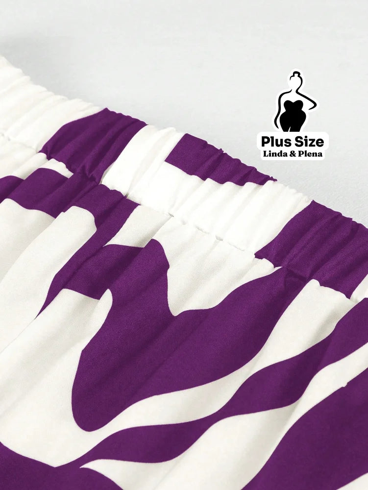 Conjunto Estampado com Camisa Aberta e Calça Solta Plus Size Conjunto Estampado com Camisa Aberta e Calça Solta Plus