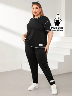 Conjunto Esportivo Com Blusa Solta E Calça Justa Plus Size Conjunto Esportivo Com Blusa Solta E Calça Justa Plus Size