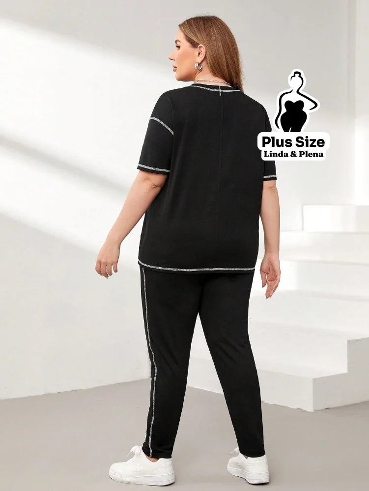 Conjunto Esportivo Com Blusa Solta E Calça Justa Plus Size Conjunto Esportivo Com Blusa Solta E Calça Justa Plus Size
