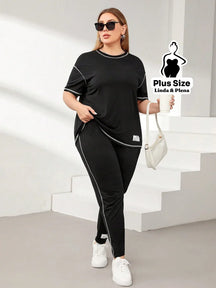 Conjunto Esportivo Com Blusa Solta E Calça Justa Plus Size Preto / G Conjunto Esportivo Com Blusa Solta E Calça Justa