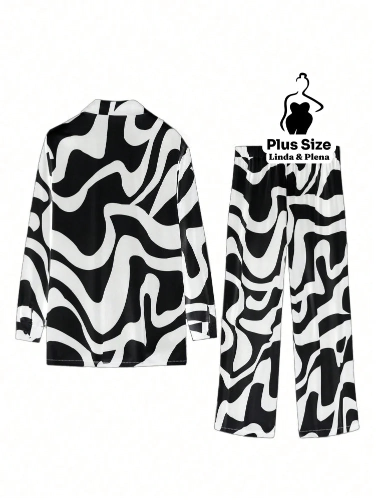Conjunto Estampado com Camisa Aberta e Calça Solta Plus Size Conjunto Estampado com Camisa Aberta e Calça Solta Plus