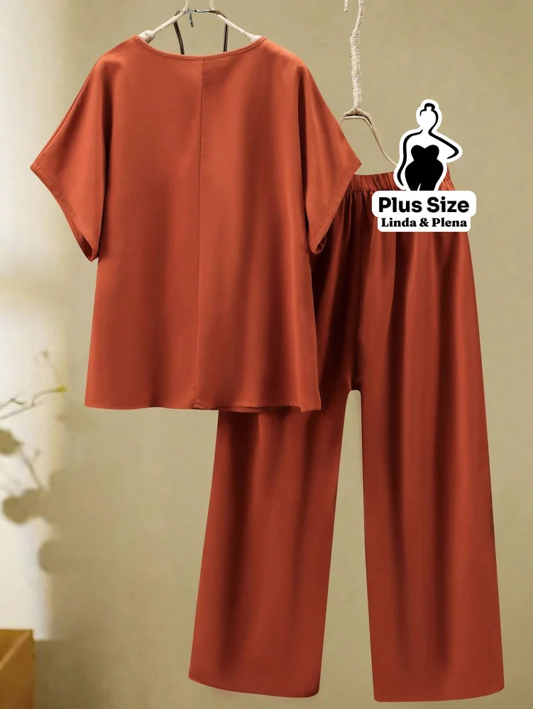Conjunto Minimalista com Blusa Solta e Calça Reta Plus Size Conjunto Minimalista com Blusa Solta e Calça Reta Plus Size